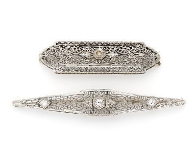 2 14k White Gold Filigree Brooches. Two 14k white gold Art Deco filigree brooches. One set with 