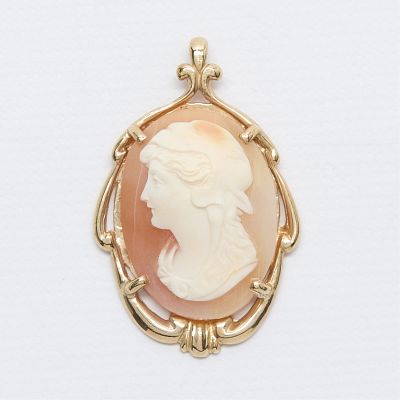 14k Yellow Gold & Shell Cameo Pendant. 14k yellow gold Art Nouveau form pendant set with shell 