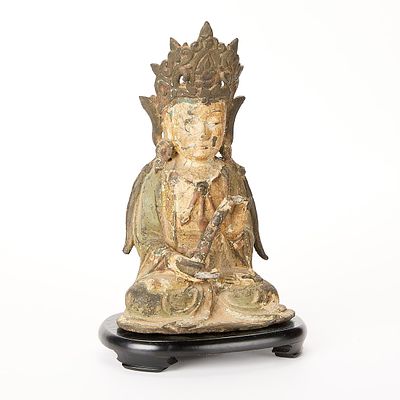 Early Chinese Polychrome Bronze Buddha Figure. Early Chinese polychrome bronze sculpture 