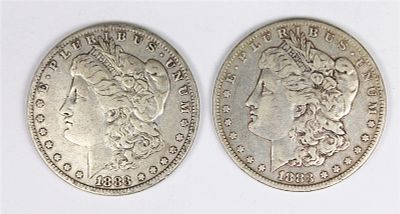 (2) MORGAN SILVER DOLLARS. XF. 1883 AND 1883-O. ESTIMATE: $100-$150