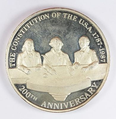 12 OZ SILVER ROUND. "THE CONSTITUTION OF THE U.S.A. 1787-1987 200TH ANNIVERSARY. ESTIMATE: $450-$500