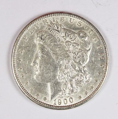 1900 MORGAN SILVER DOLLAR. AU. BLAST WHITE! ESTIMATE: $50-$75