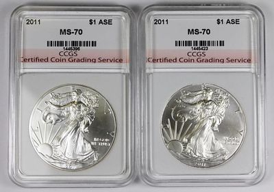 (2) 2011 AMERICAN SILVER EAGLES. CCGS MS 70. BLAST WHITE GEMS! ESTIMATE: $200-$250