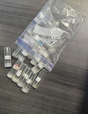 DIME HOLDERS. 20- EMPTY CLEAR CIRCULAR PLASTIC DIME HOLDERS. ESTIMATE: $1-$50.