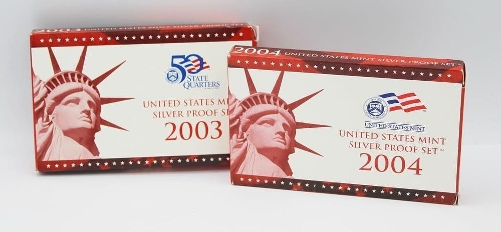 2003 &2004 SILVER PROOF SETS. COMES IN ORIGINAL GOVERNMENT PACKAGING. ESTIMATE: $100-$150.
