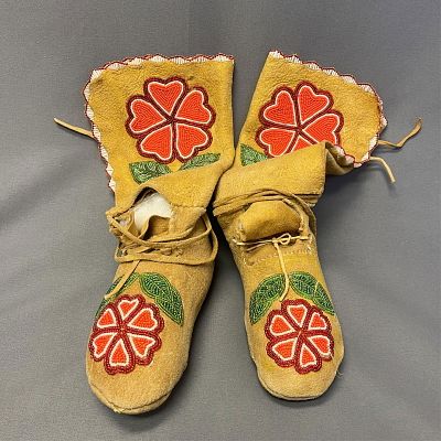 Beaded Floral High-Top Moccasins 9" long x 3 1/2" wide x 12 1/2" high. Beaded Floral High-Top 
