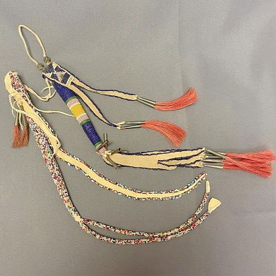 2 vintage No. Plains beaded awl cases 1. 20" long overall, 2. 21" long. 2 vintage No. Plains 