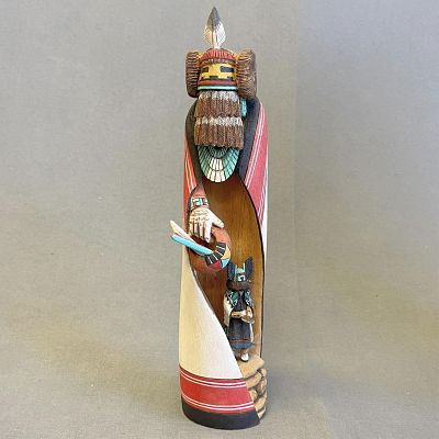 Hopi Maiden sculptural Kachina with a Miniature Crow Mother by Neil Naha 10" tall to tip of feather.