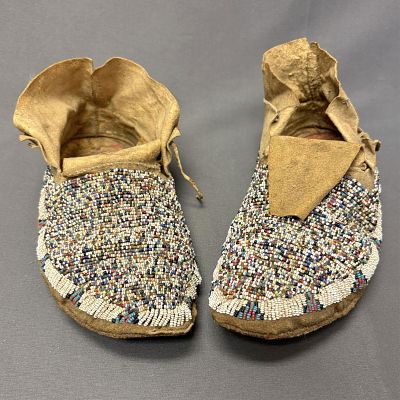 Antique Northern Plains Beaded Moccasins with Parfleche Soles, ca. late 1800s 10" long x 4 1/4" wide