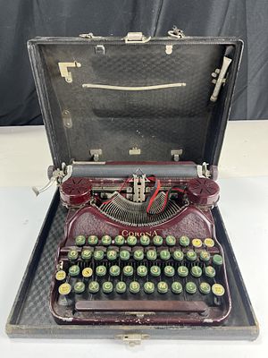 Corona four lavender typewriter, early 1930s with road case, original ribbon covers,
