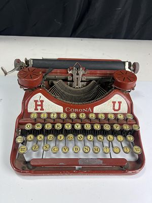 Circa 1929 Corona four, brick red typewriter with Harvard University letters, L.C. Smith and Corona,