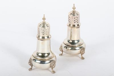 Amston sterling silver salt and pepper shakers, tableware with lion head paw feet. 5in tall 