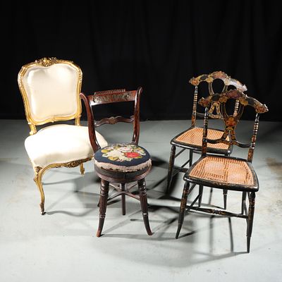 Four antique chairs: 2 Victorian ebonized cane seat chairs with gilt floral painted design 