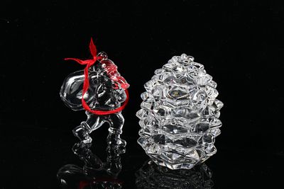 Tiffany & Co. crystal decorative holiday object 2pc. group: pine cone trinket box and Santa 