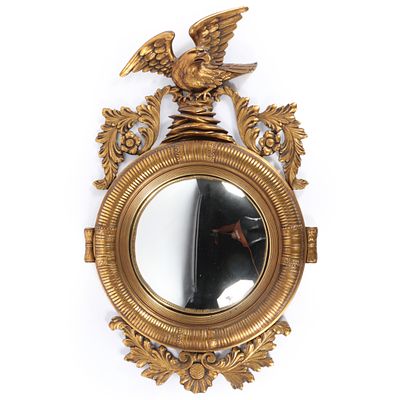 Regency / Federal style giltwood convex bullseye mirror with eagle and acanthus leaf carvings. 