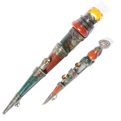 Pair of unmarked sterling silver Scottish agate dirk pins with gemstone hilts. 4"L x 1/2"W 