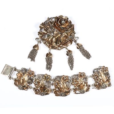 Hobe sterling vermeil intricate floral brooch and matching panel bracelet. 6 3/4"L x 1 3/8"W 