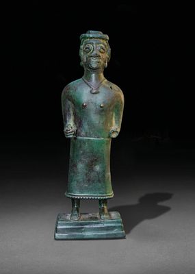 Near Eastern Bronze figure, Early Bronze Age or Middle Bronze Age. It depicts a standing male 