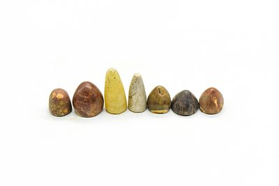 Ancient Islamic Stone Gaming Pieces, Group of Seven, Medieval Islamic period. A rare and 