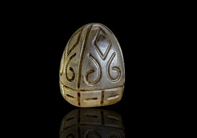 A FATIMID CARVED ROCK CRYSTAL CHESS PIECE, EGYPT, Islamic. It features deep bevel-cut foliate 