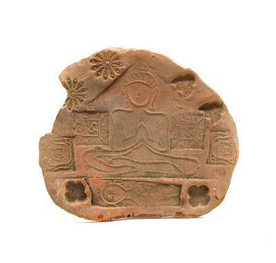Terracotta votive Plaque featuring a Seated figure in a Meditative Pose, Indian. This artifact 