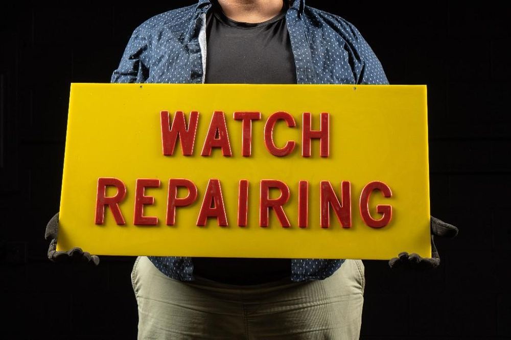 Lot 228: Vintage Acrylic Watch Repair Sign