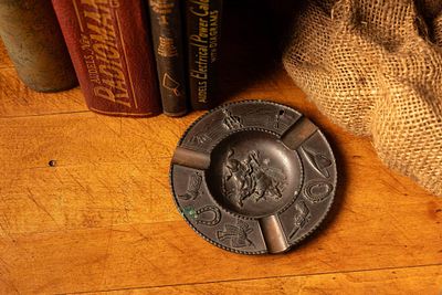 Occupied Japan Cowboy Cast Metal Ashtray. Item SKU: 4598 This vintage cast metal ashtray was 