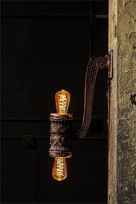 Early 20th Century Greek-Inspired Copper Sconce. Item SKU: 6229 Ornate antique mounted light 
