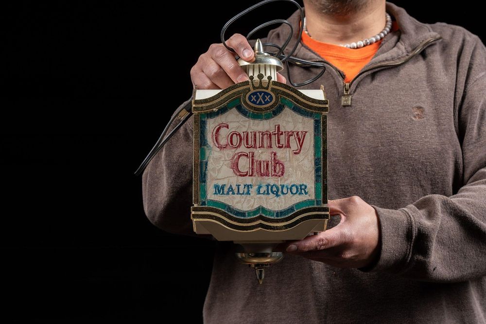 Lot 160: Country Club Malt Liquor Lantern Beer Sign