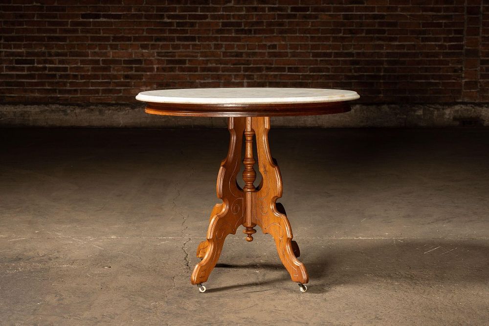 Lot 222: Wooden Table With White Marble Top and Casters 2