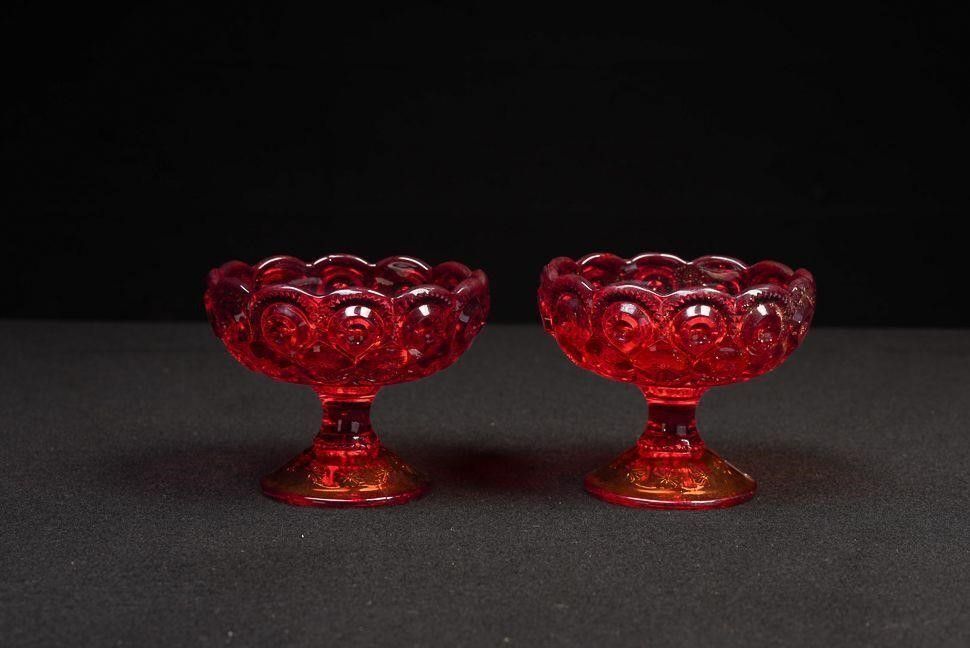 Lot 339: Pair of Ruby Red Glass Moon-Stars Candle Holders