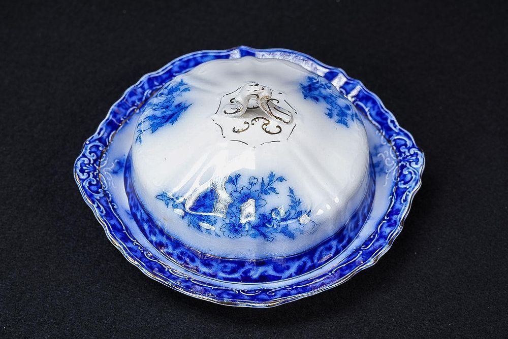 Lot 409: Alcock Flow Blue "Touraine" Covered Butter Dish