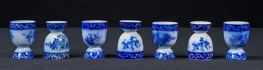 Lot 413: Set of Seven Victorian Flow Blue Egg Cups