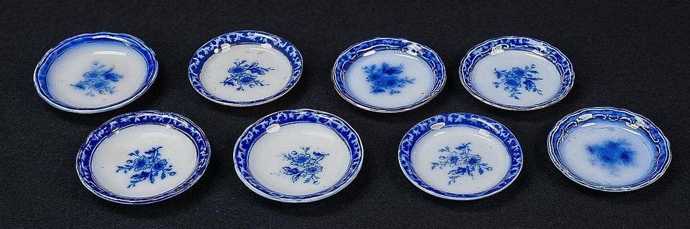 Lot 419: Set of Eight Victorian Flow Blue Saucers