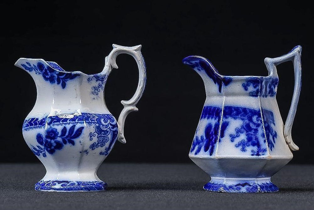 Lot 432: Pair of Flow Blue Creamer Pitchers