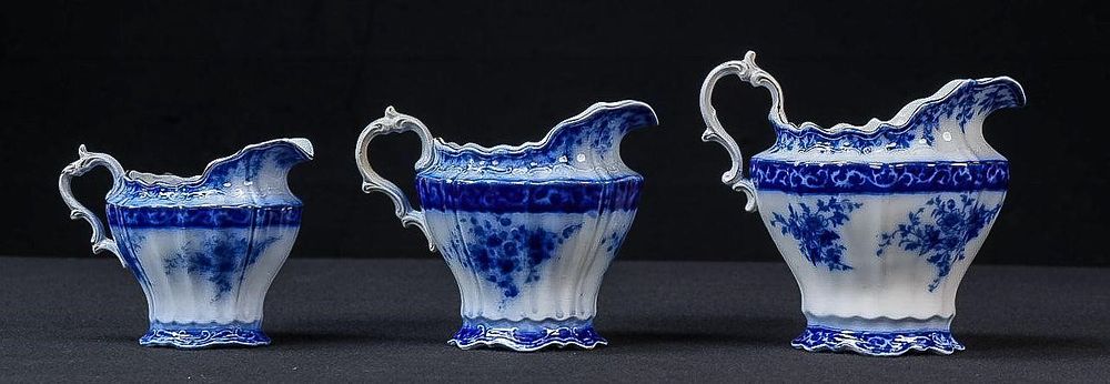 Lot 439: Set of Three Alcock "Touraine" Flow Blue Pitchers