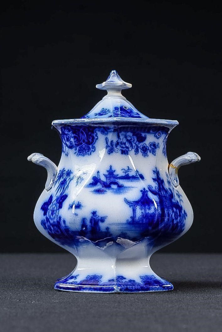 Lot 445: Victorian Six-Sided Flow Blue Lidded Sugar