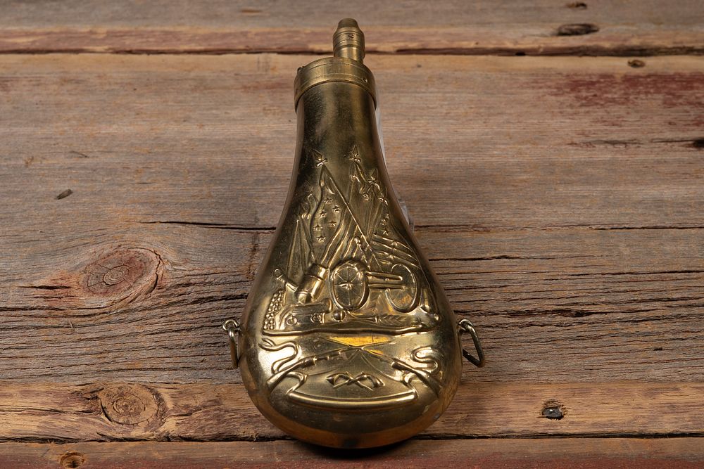 Lot 200: Embossed Civil War Motif Brass Powder Flask