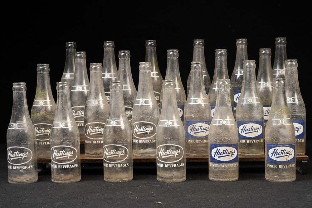 Lot 272: Set of 24 "Hustings" Glass Bottles with Crate
