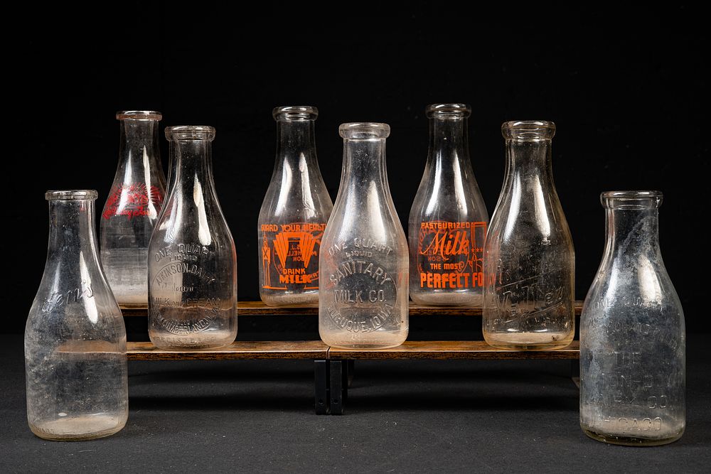 Lot 275: Vintage 1-Quart Milk Bottles with Metal Carrier