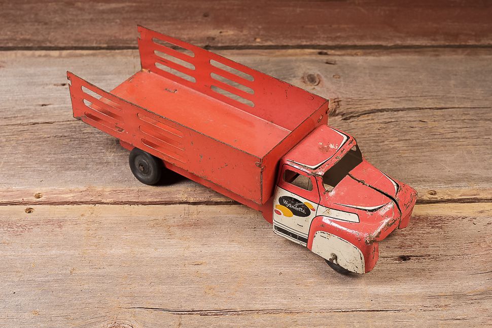 Lot 395: Wyandotte Pressed Steel Stake Bed Truck