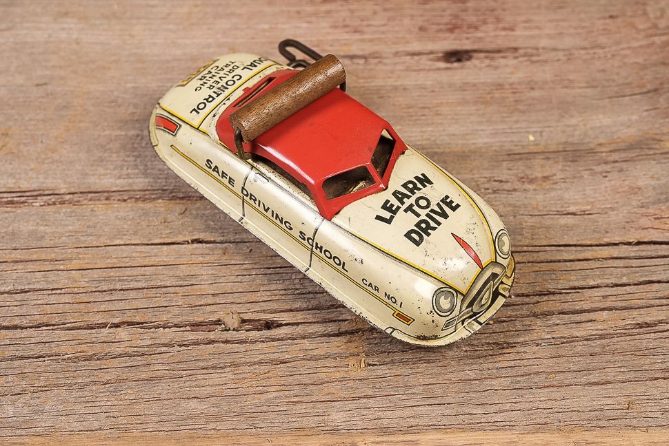 Lot 401: Tin Litho -Learn to Drive- Wind-Up Training Car
