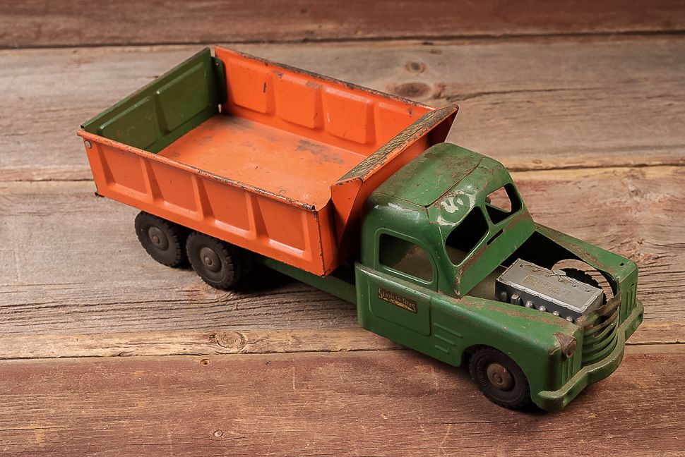 Lot 421: Structo Pressed Steel Dump Truck w Fireball Motor