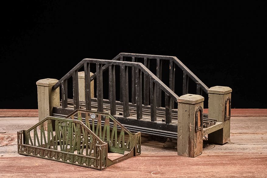 Lot 445: Pair of Lionel Train Bridges – Wood and Cast Metal
