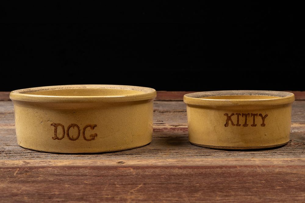 Lot 470: Pair of Antique Stoneware Pet Food Bowls