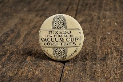 Tuxedo Vacuum Cup Cord Tires Pinback Button. C-14455 This is an original early 20th-century 