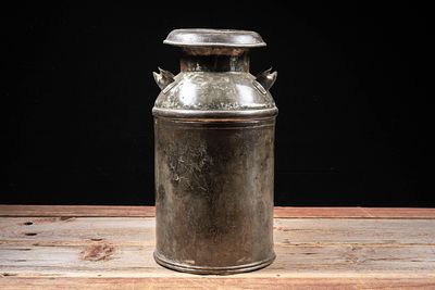 Embossed Metal Milk Can. C-20744 Metal dairy milk can with domed lid and side handles, embossed 