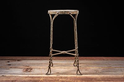 Primitive Twisted Iron and Wood Stool. C-20747 Primitive four-legged utility stool with twisted 