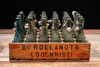 Lot of Belgian Swing Top Beer Bottles with Crate. C-20801 Group of green glass swing top beer 