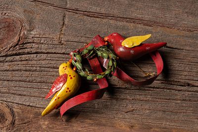 Painted Metal Folk Art Lovebirds Holiday Ornament. C-18851 Painted metal hanging ornament 